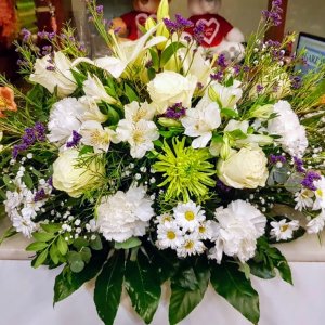 Centro flor fresca funeral Pisistrato